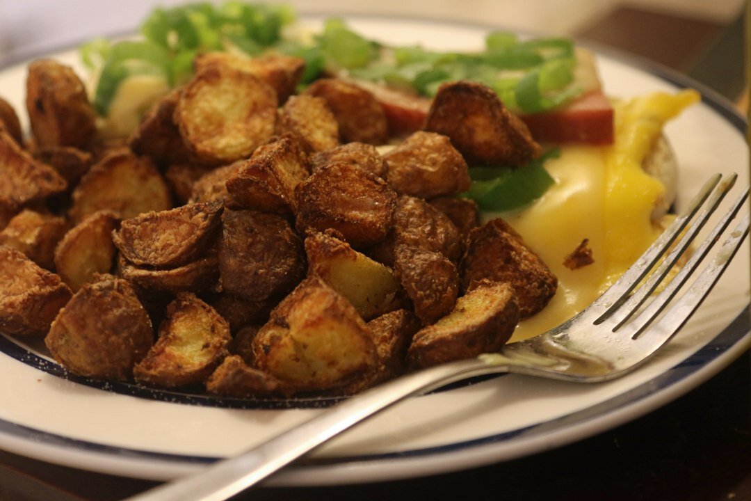 crispy golden potatoes on plate