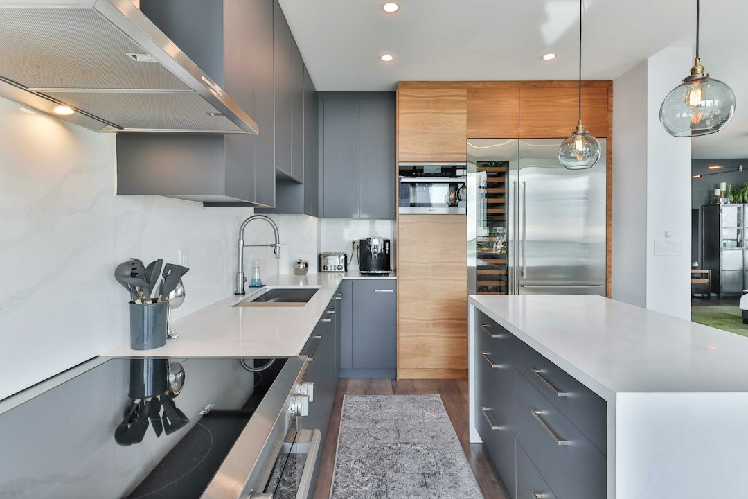 Bright modern Czech home kitchen with wooden cabinets