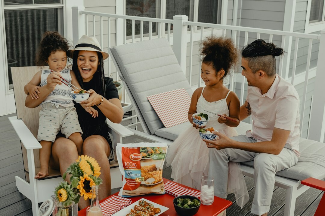 family enjoying barbecue