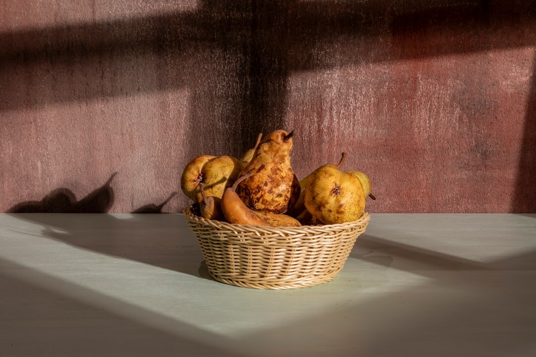 Basket of mushrooms, apples and pumpkins in autumn